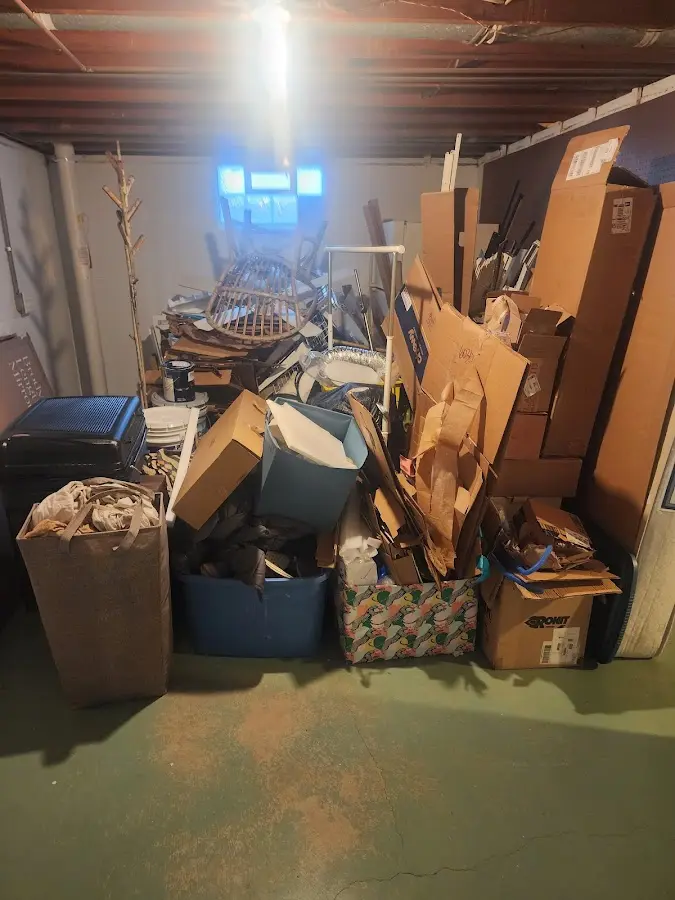 Roll-off dumpster container at job site for 2 Yard Dumpster Rental in Van Wert